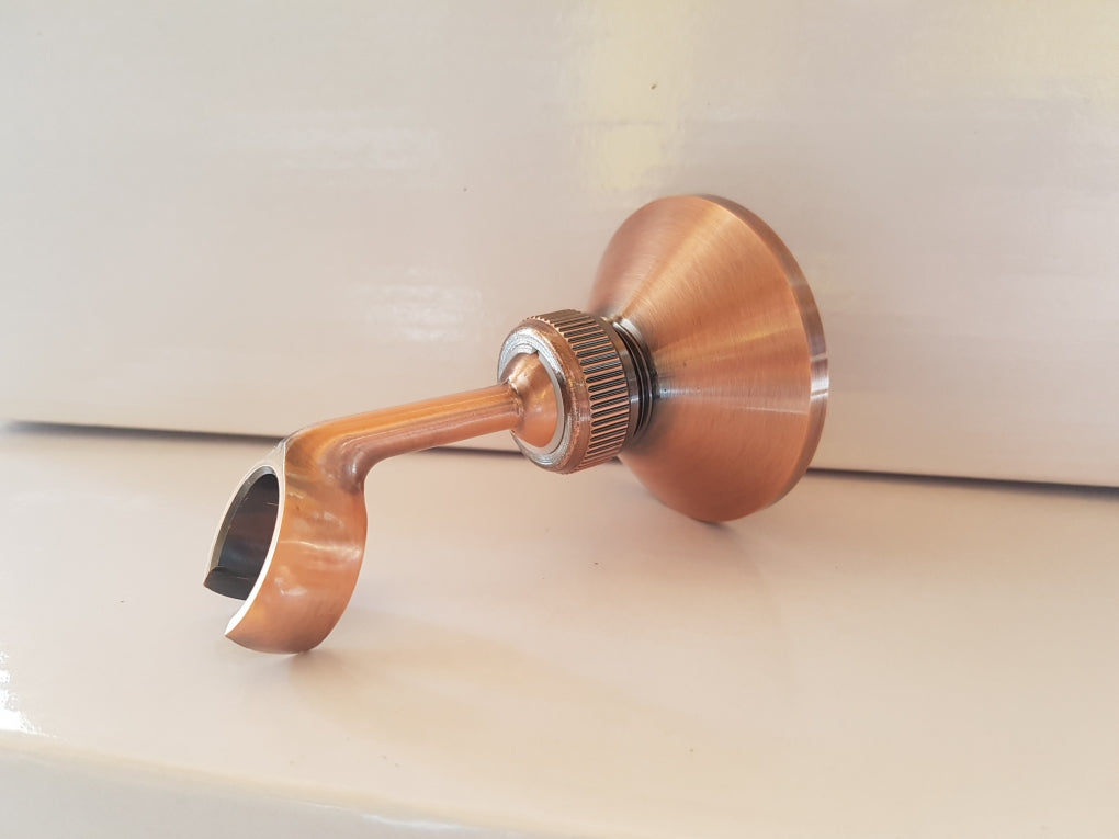 Copper-colored hand shower attachment