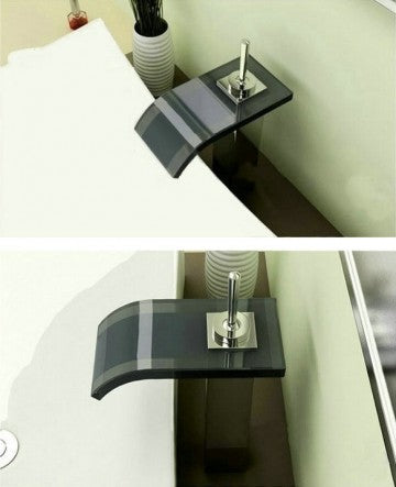 Waterfall faucet with dark colored glass mouth