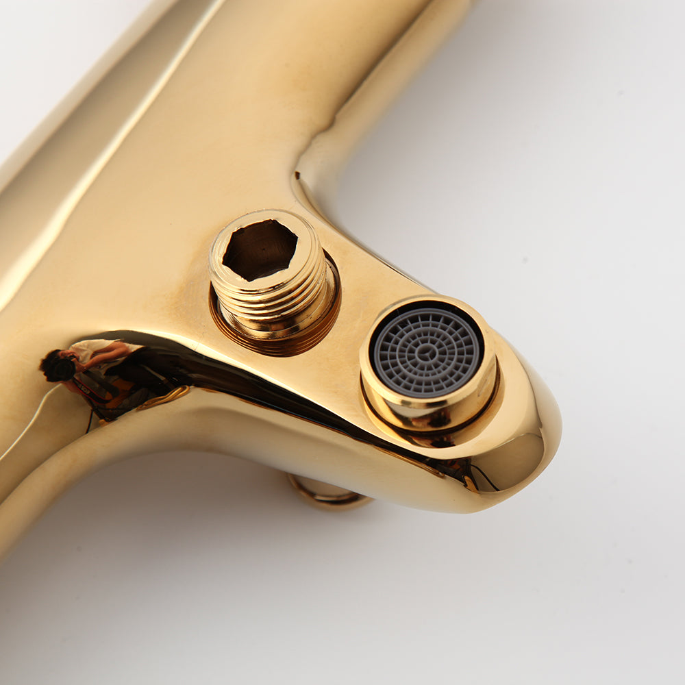 Gold-colored thermostatic bath tap