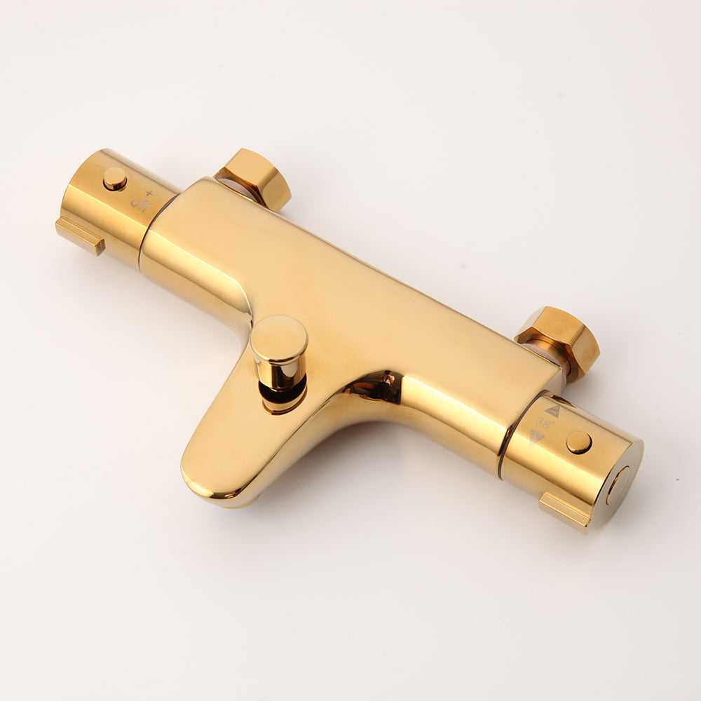 Gold-colored thermostatic bath tap