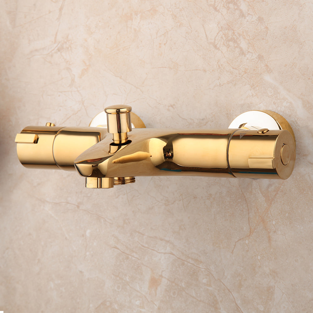 Gold-colored thermostatic bath tap