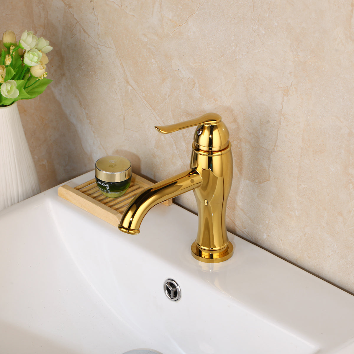 Gold-colored washbasin tap