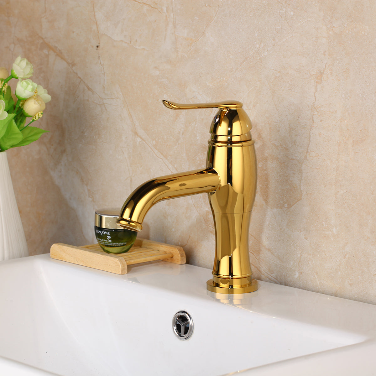 Gold-colored washbasin tap