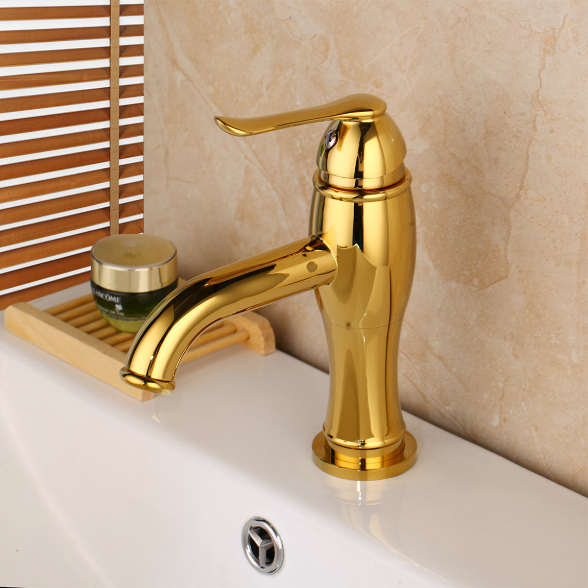 Gold-colored washbasin tap