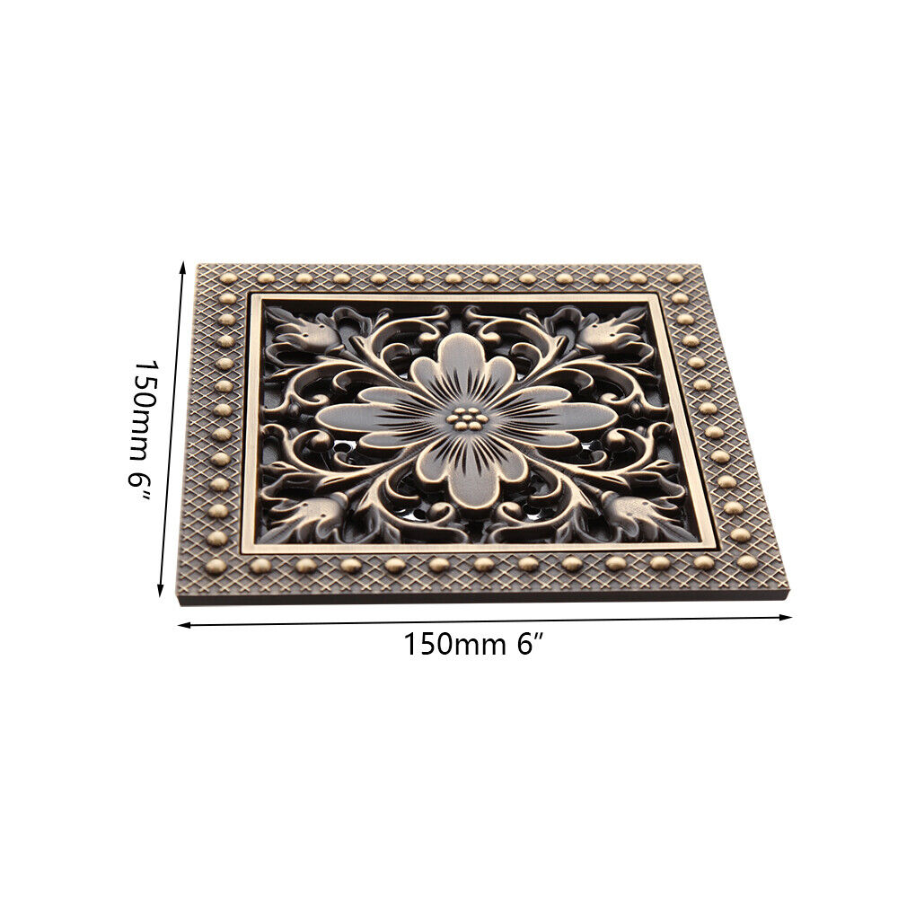 Bronze-colored shower drain with flower motif