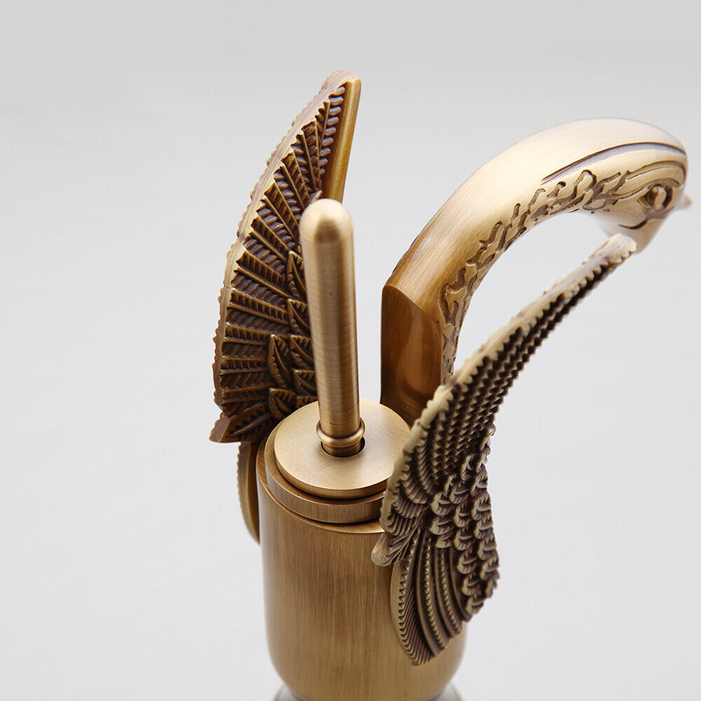 Bronze-colored mixer tap in the shape of an elegant swan