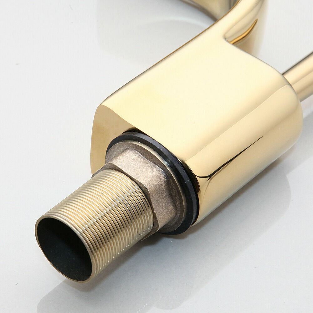 Gold-colored waterfall tap