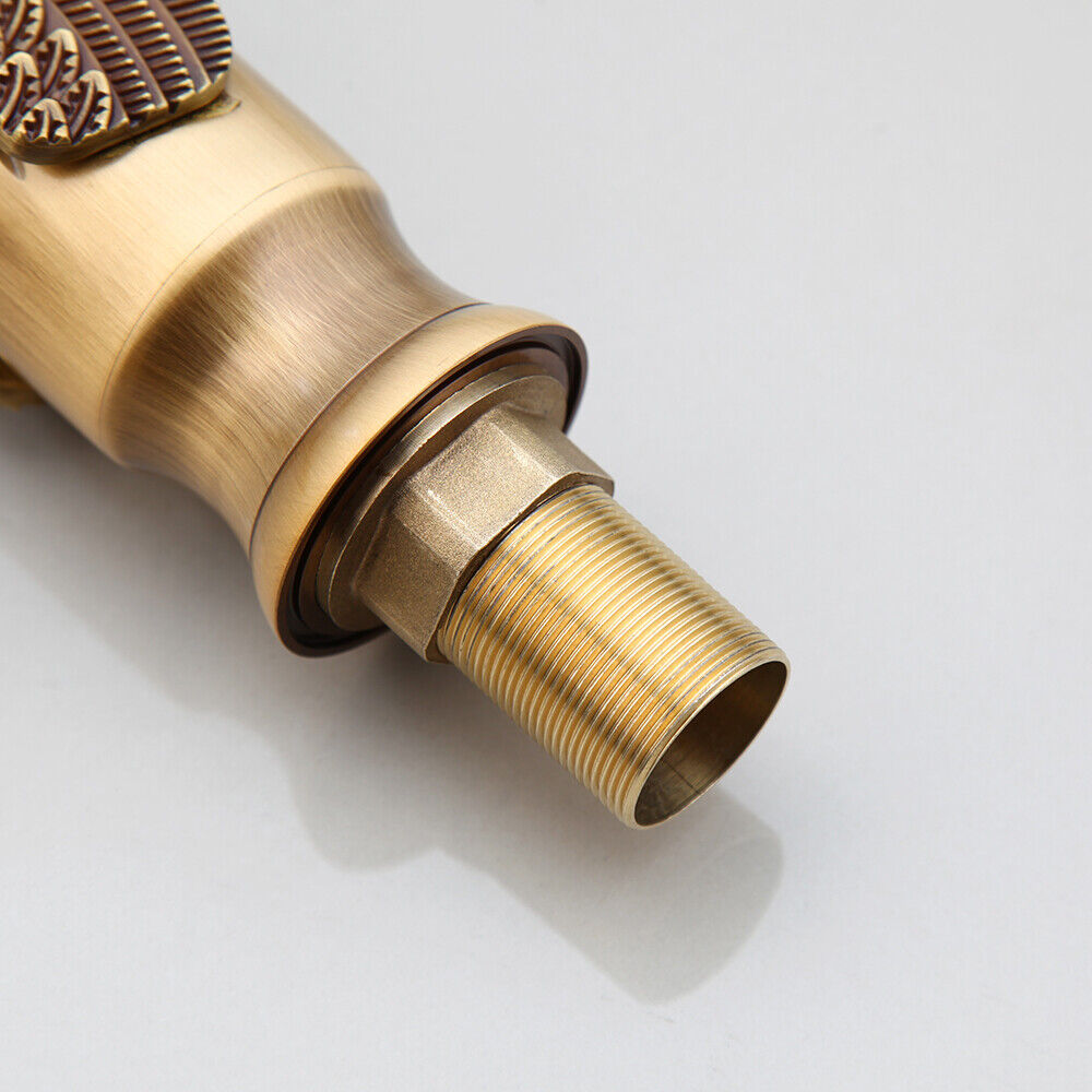 Bronze-colored mixer tap in the shape of an elegant swan