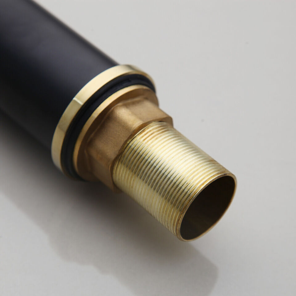 Black washbasin mixer tap with gold-colored elements
