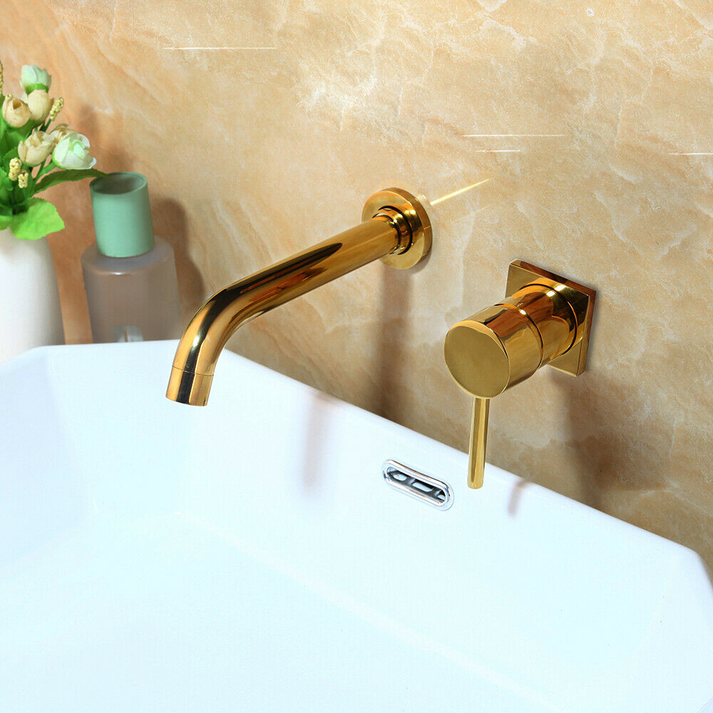 Gold-colored wall tap