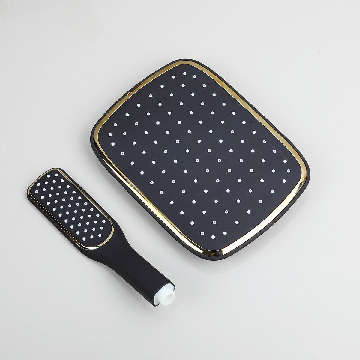 Matt black and gold surface-mounted shower