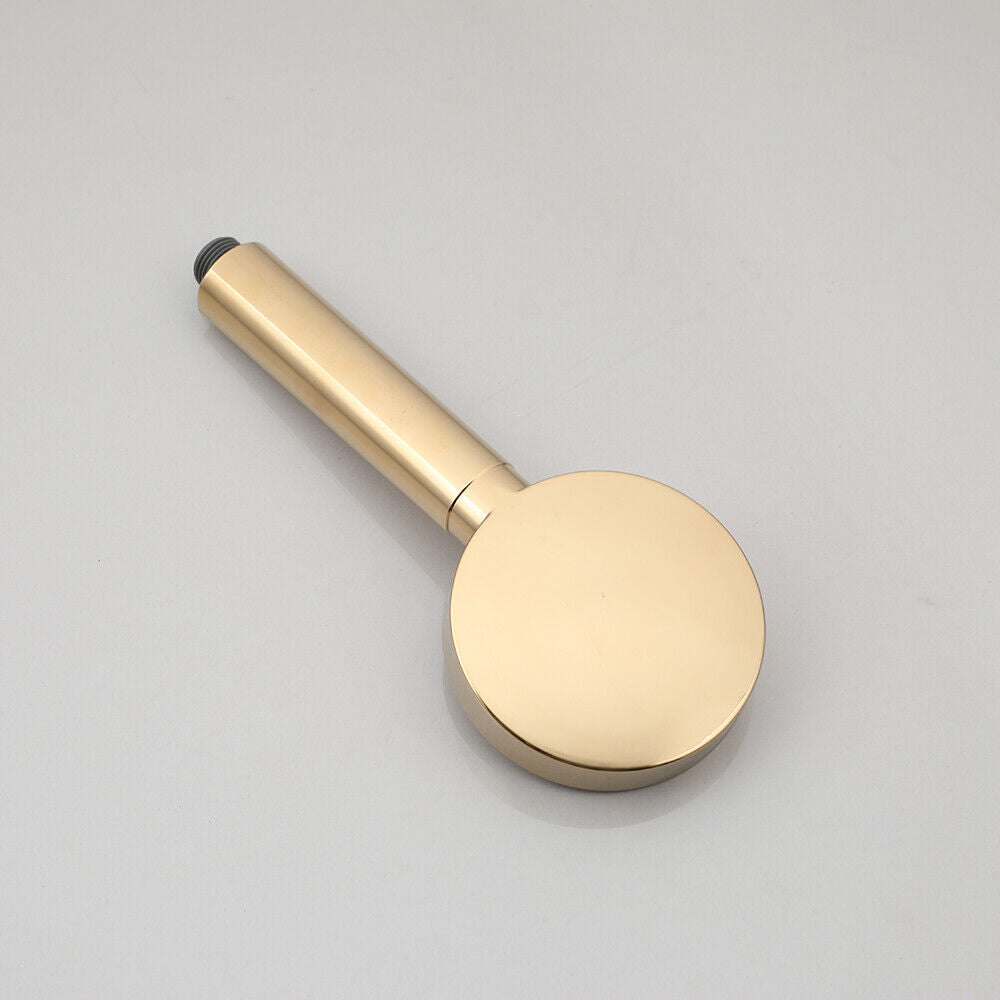 Goldfarbene Duschstange mit Handbrause