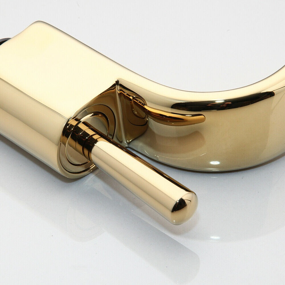 Gold-colored waterfall tap