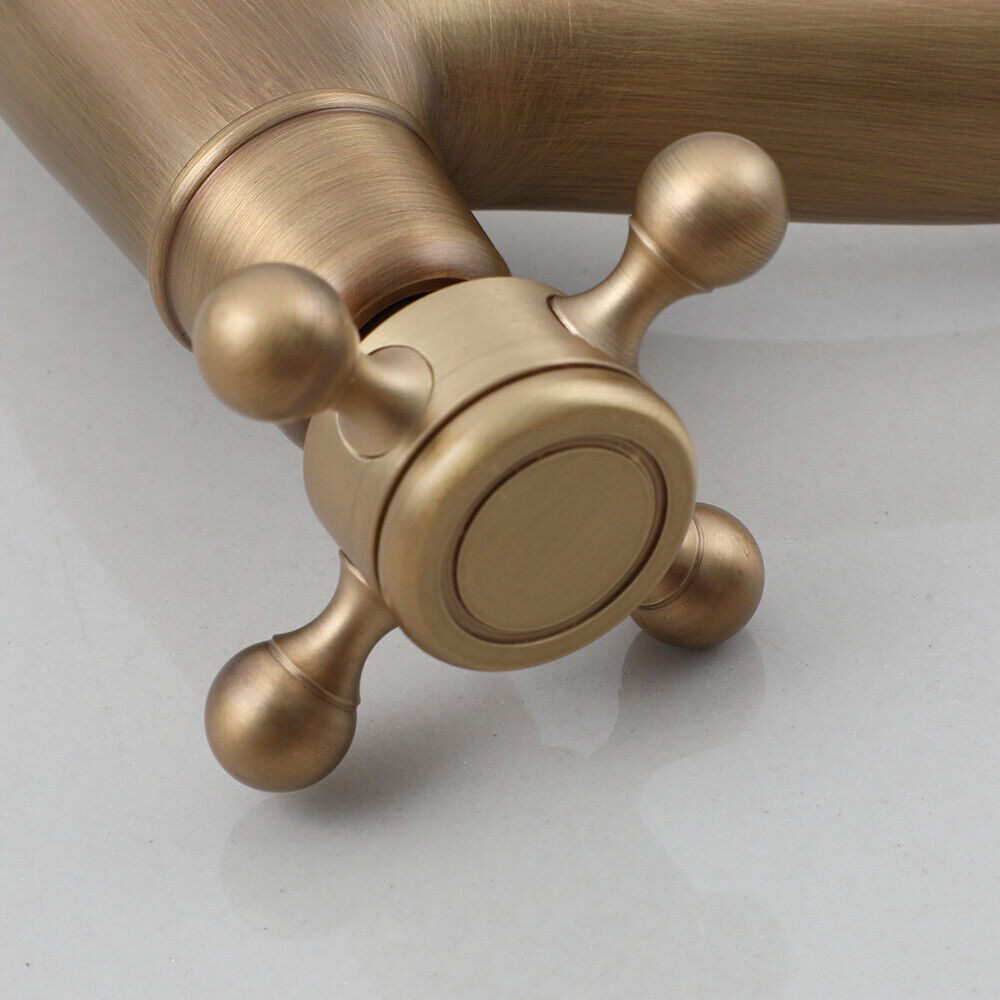 Bronze-colored rural fountain tap with cold water