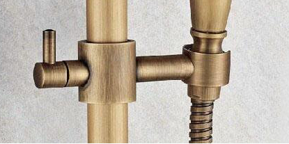 Bronze-colored hand shower holder for surface-mounted rain shower