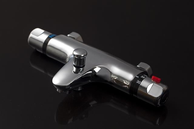 Thermostatic bath tap with hand shower connection.