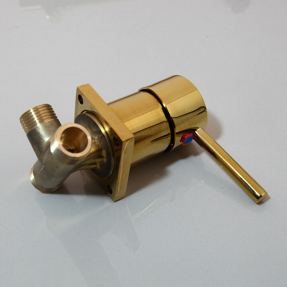 Gold-colored wall tap