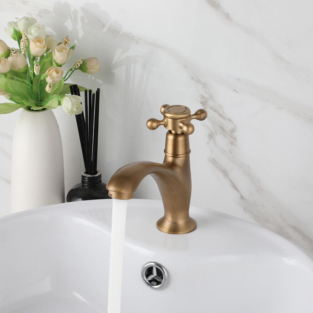 Bronze-colored rural fountain tap with cold water