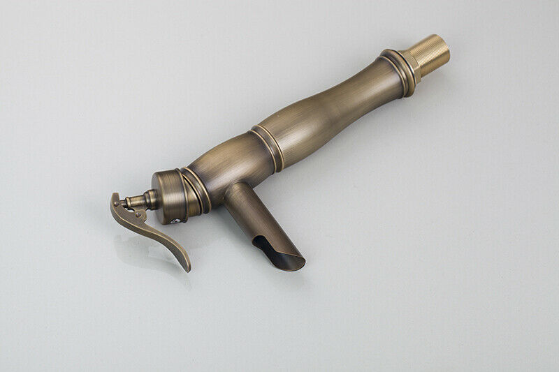 Bronze colored waterfall mixer tap