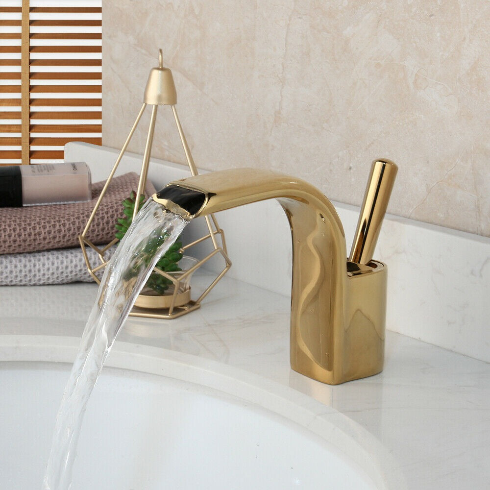 Gold-colored waterfall tap