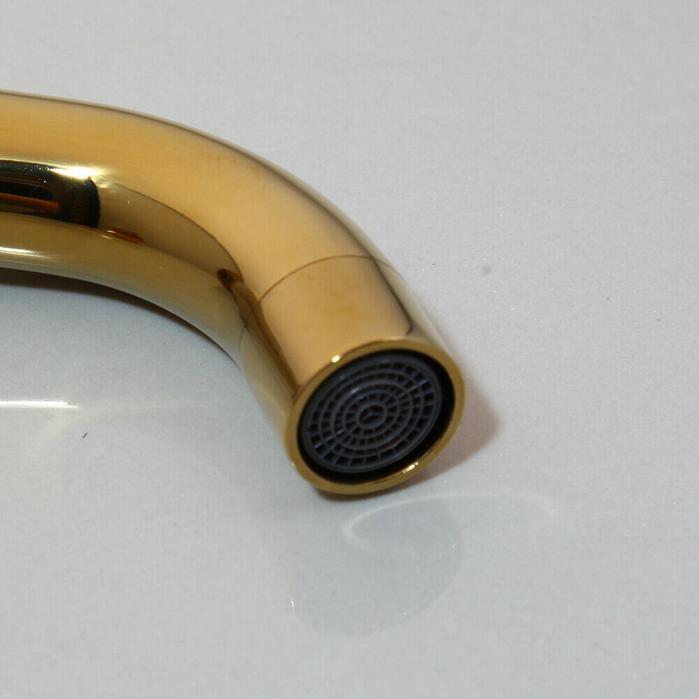 Gold-colored wall tap