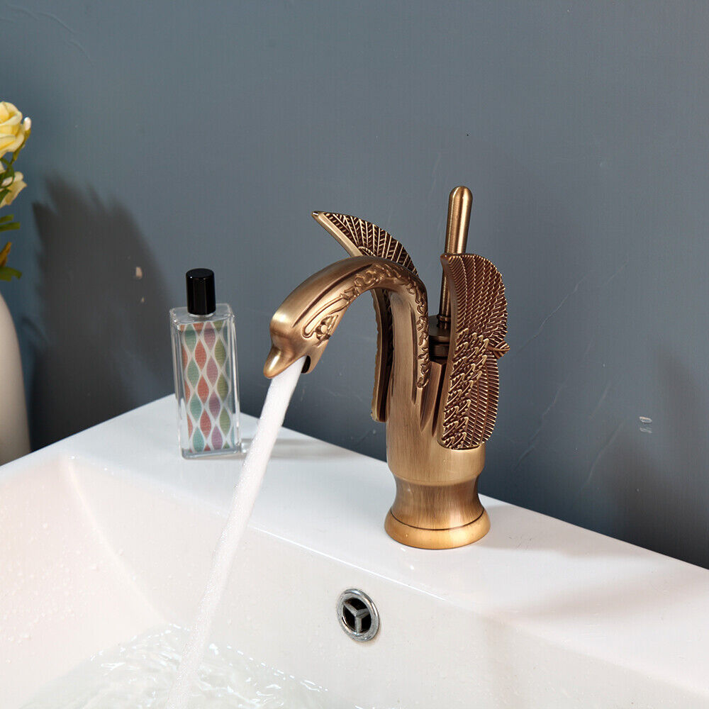 Bronze-colored mixer tap in the shape of an elegant swan