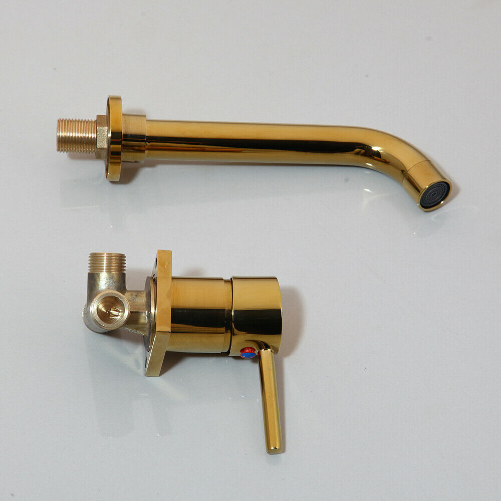 Gold-colored wall tap