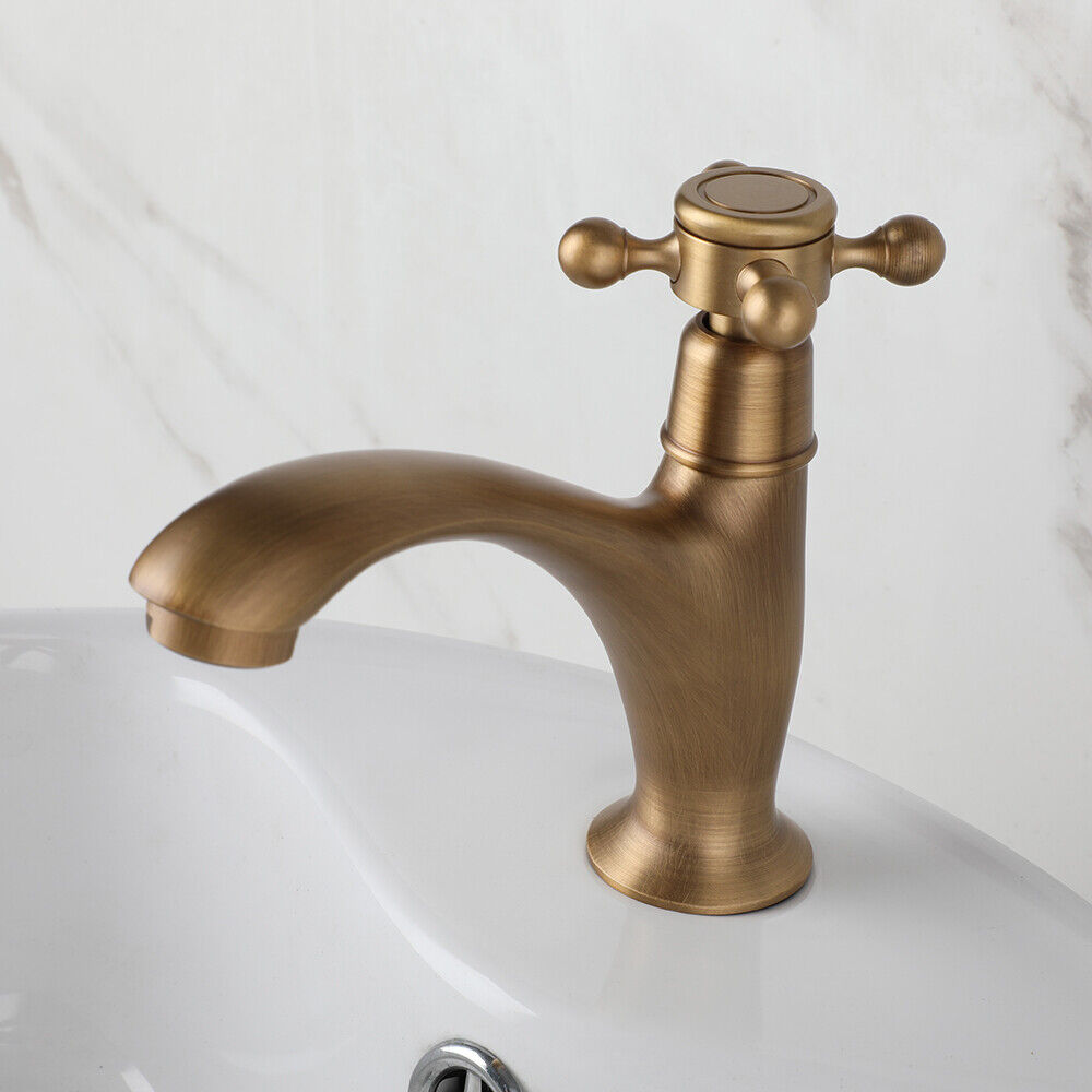 Bronze-colored rural fountain tap with cold water