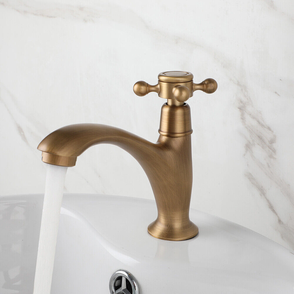 Bronze-colored rural fountain tap with cold water