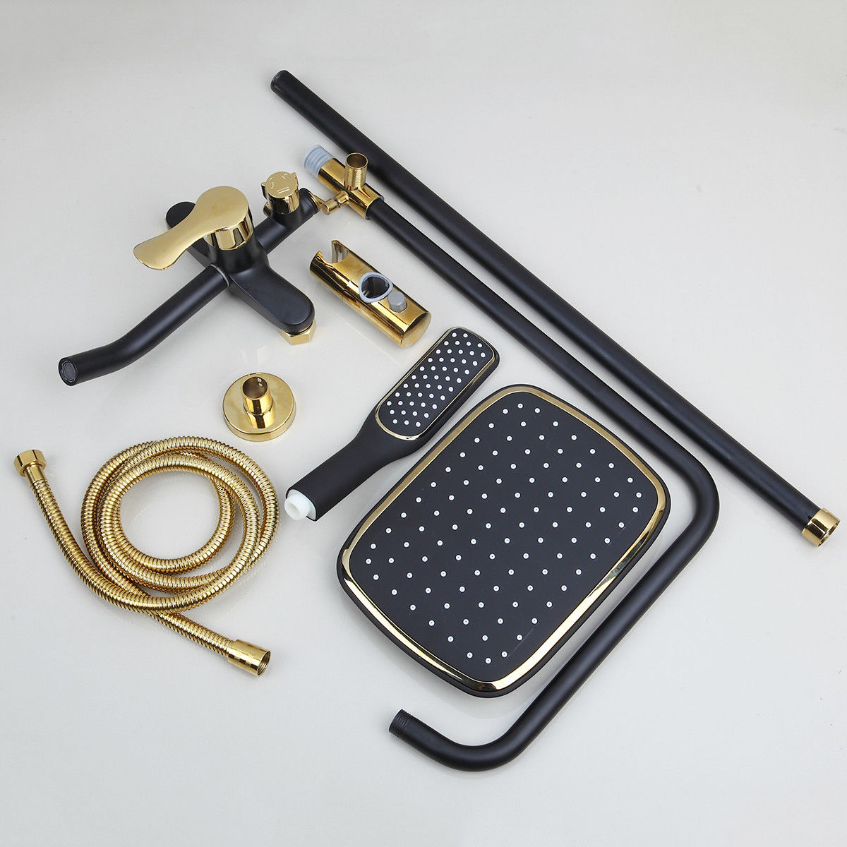 Matt black and gold surface-mounted shower
