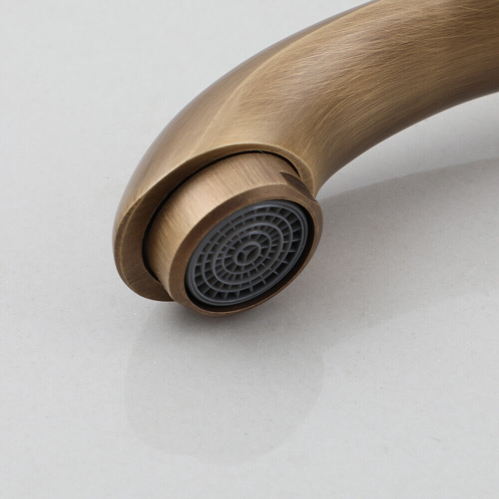 Bronze-colored rural fountain tap with cold water