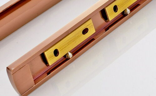 Toilet roll holder in rose gold color