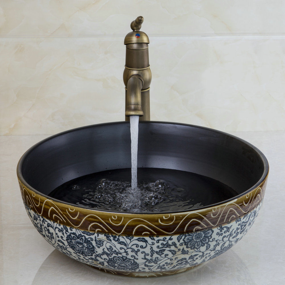 Bronze faucet with hand-painted ceramic washbasin