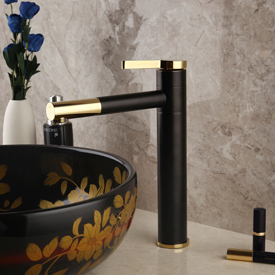 Black washbasin mixer tap with gold-colored elements