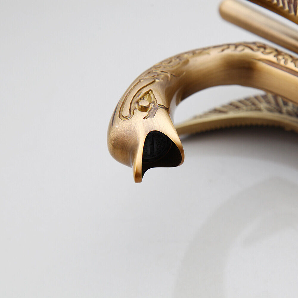 Bronze-colored mixer tap in the shape of an elegant swan