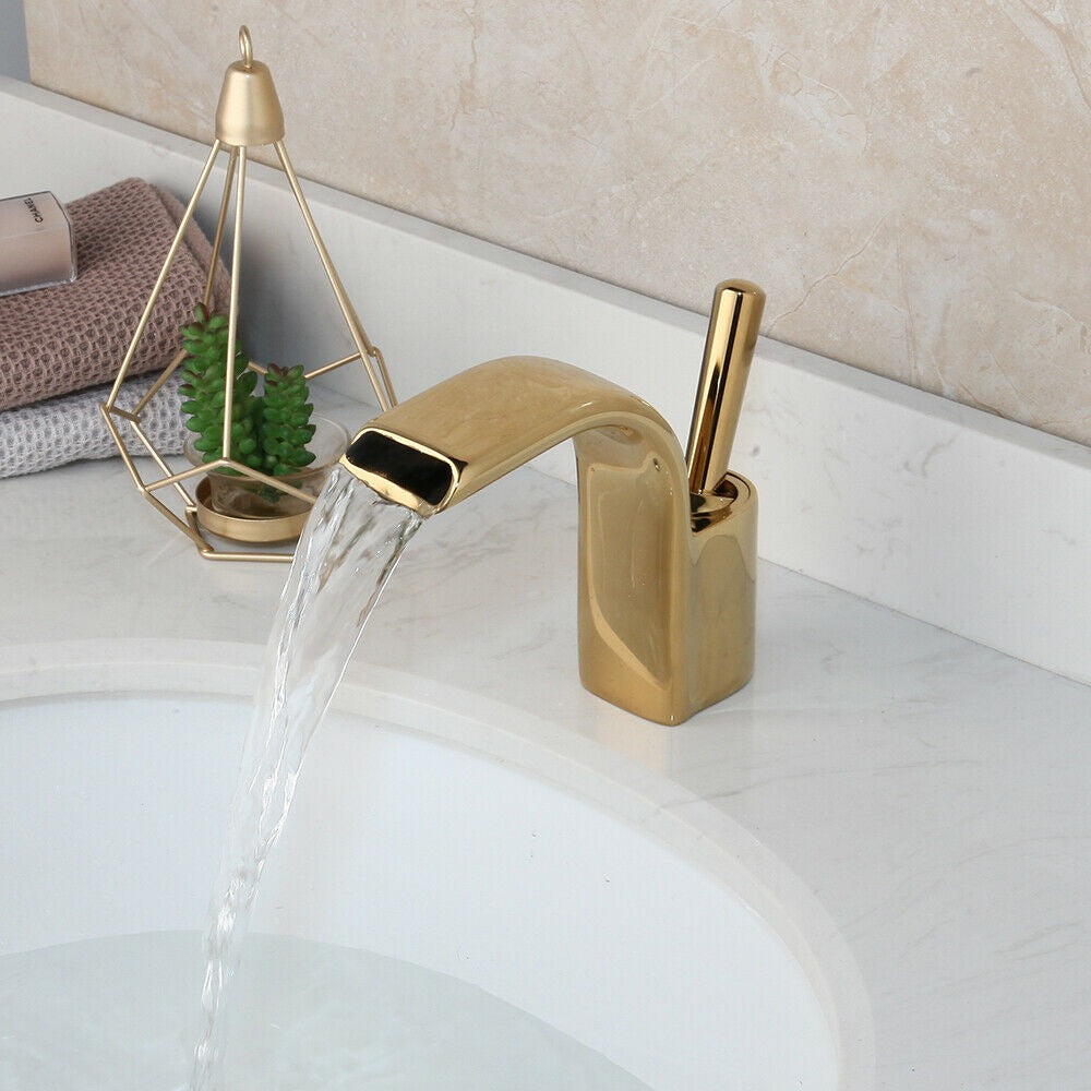 Gold-colored waterfall tap