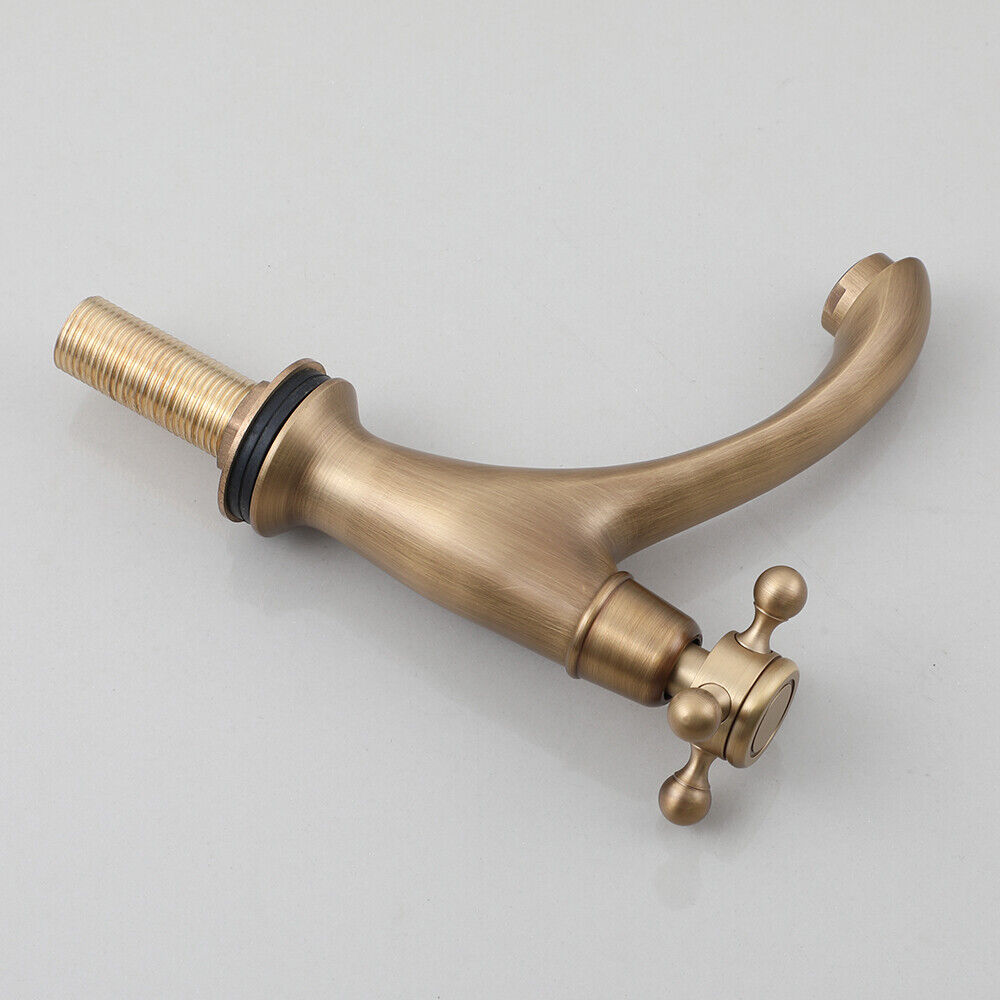 Bronze-colored rural fountain tap with cold water