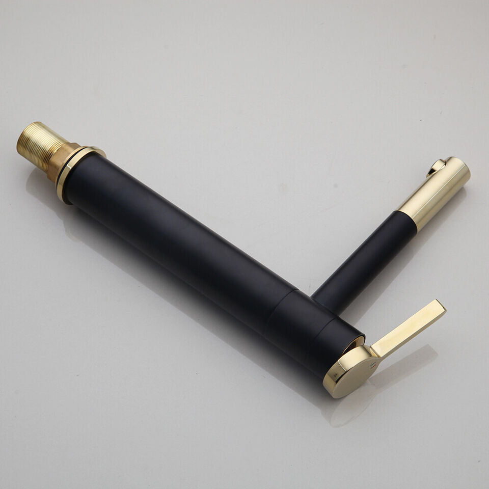 Black washbasin mixer tap with gold-colored elements