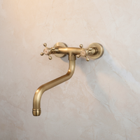 Nostalgic bronze-colored mixer tap with long spout