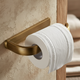 bronze-colored toilet roll holder