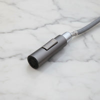 Elegant Gun Metal kitchen faucet with pull-out spray head