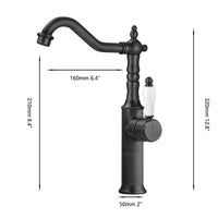 Zwarte wastafelkraan klassiek hoog model met porseleinen greep