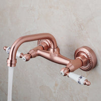 Koperkleurige landelijke muurkraan met keramische handgrepen