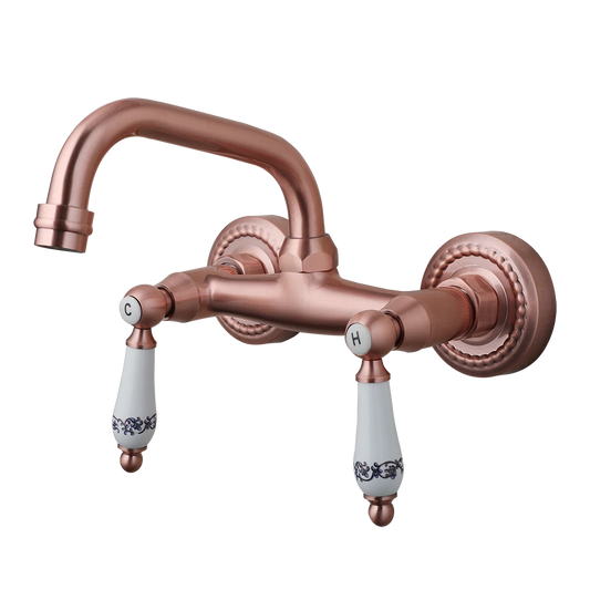 Koperkleurige landelijke muurkraan met keramische handgrepen