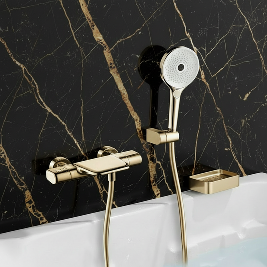 Gouden thermostatische badkraan met handdouche
