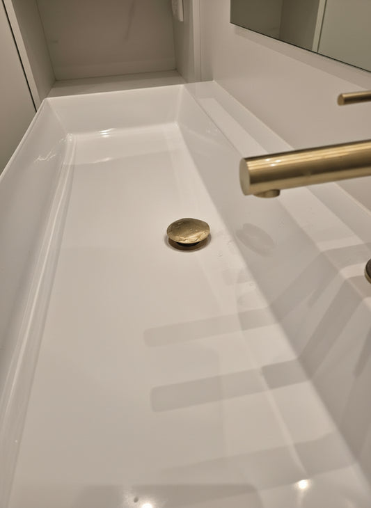 Click drain matt gold