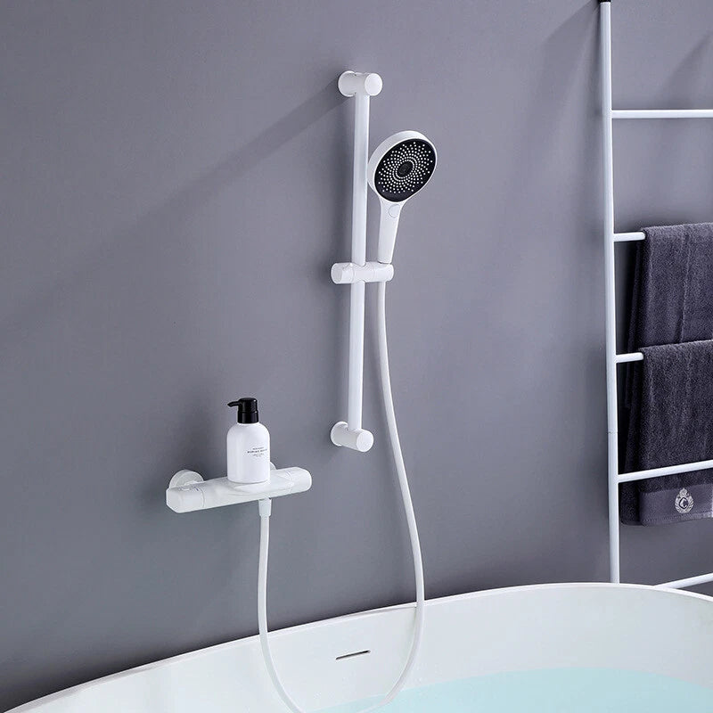 Witte thermostatische badkraan met handdouche en glijstang