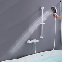 Witte thermostatische badkraan met handdouche en glijstang