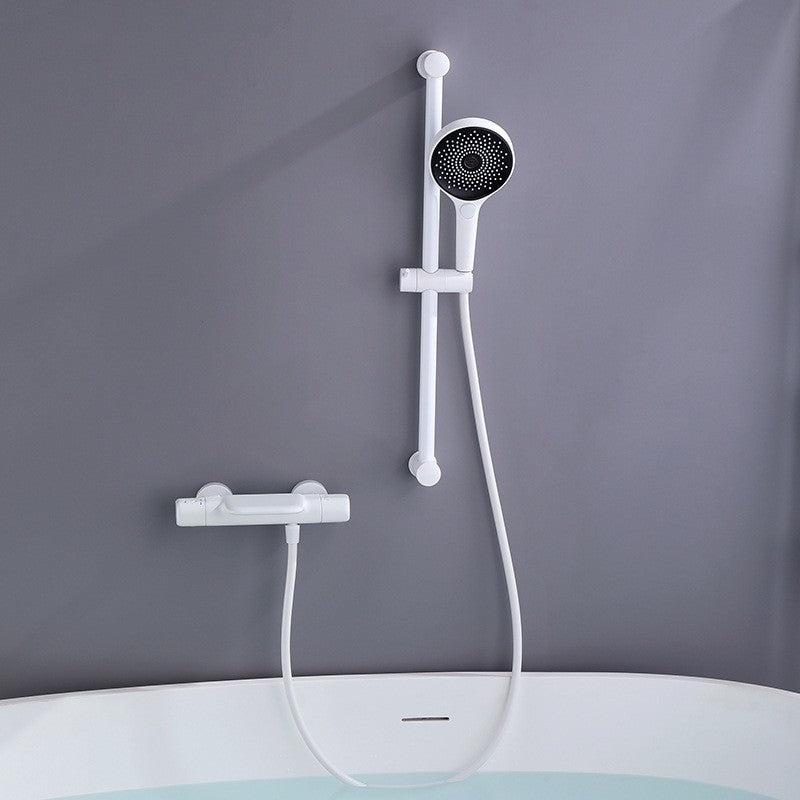 Witte thermostatische badkraan met handdouche en glijstang