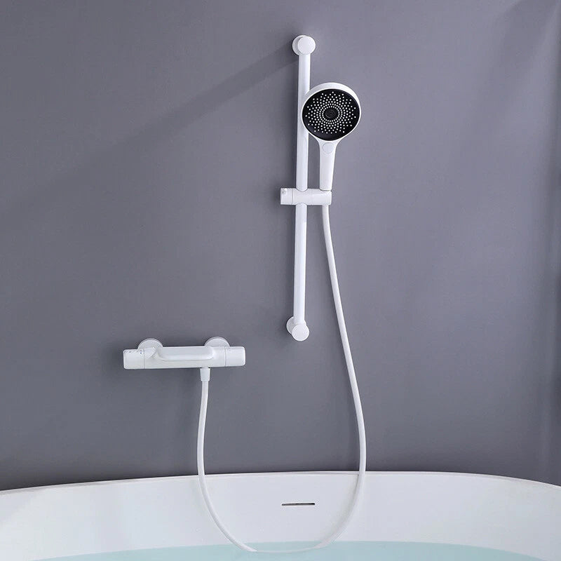 Witte thermostatische badkraan met handdouche en glijstang
